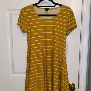 Mid-thigh length and yellow with white striped dress